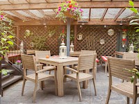 An outdoor seating area at the Malt House B&B, London