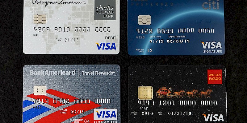 Four USA-issued chip-and-pin cards (Charles Schwab Bank Visa Debit Card, Citi ThankYou Preferred Visa Signature Credit Card, Bank of America BankAmericard Travel Rewards Visa, Wells Fargo Cash Bank Visa Signature Credit Card) (Photo by Aranami)