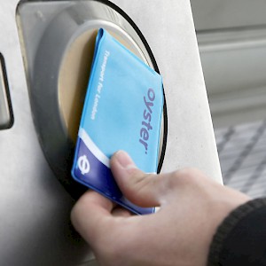 Using an Oyster Card on London public transit (Photo Â© Transport for London)