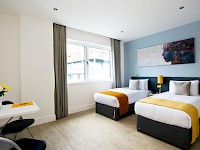 An efficiency suite room at London's StayCity Greenwich High Road
