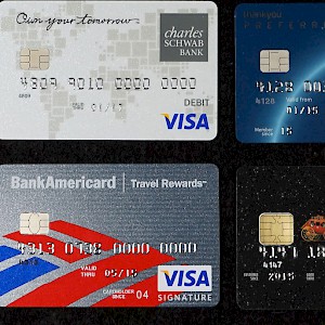 Four USA-issued chip-and-pin cards (Charles Schwab Bank Visa Debit Card, Citi ThankYou Preferred Visa Signature Credit Card, Bank of America BankAmericard Travel Rewards Visa, Wells Fargo Cash Bank Visa Signature Credit Card) (Photo by Aranami)