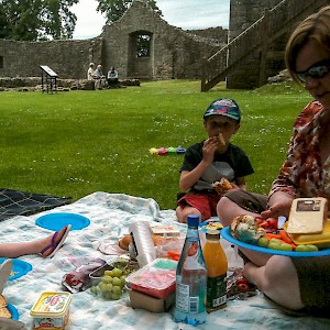 A picnic in the 1300s Lochleven Castle, where Mary Queen of Scots was imprisoned (Photo by Martin Burns)