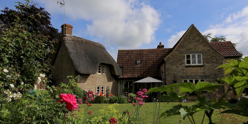 The 17C cottage and front garden, Thatch Cottage, Bath (Photo courtesy of the property)